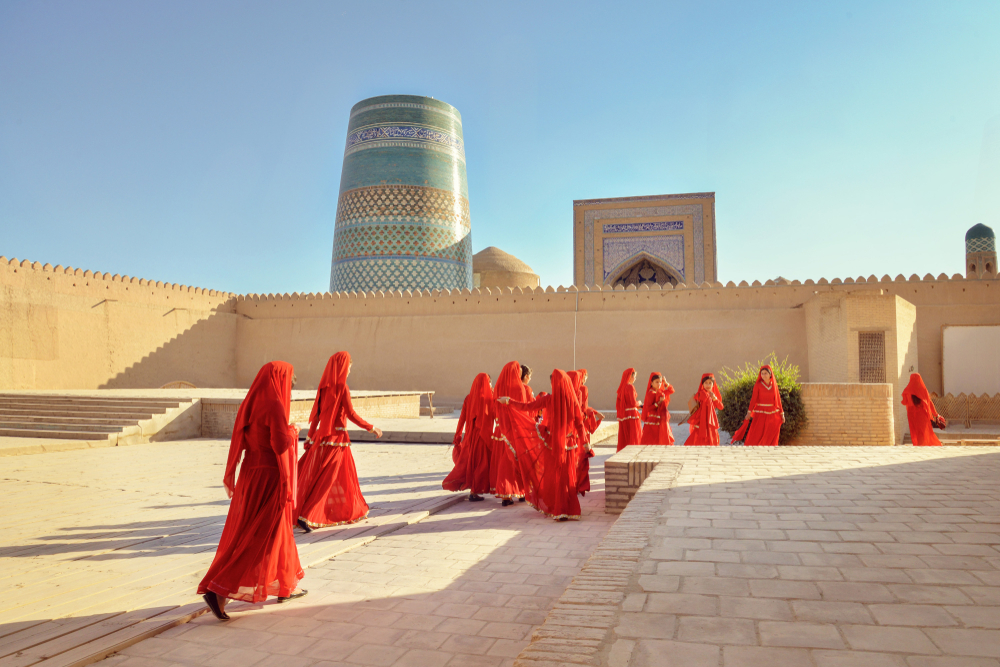 The inner city of Khiva with Kalta Minor in the background is another of the best places to visit in Uzbekistan